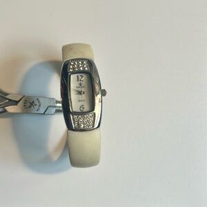 Vintage y2k silver tone cuff watch steel, rhinestones and white plastic